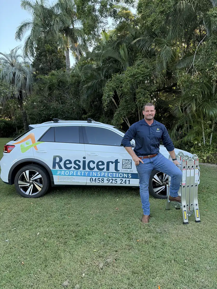 Paul beside his Resicert Property Inspections car with his inspection ladder
